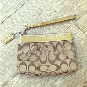Brown COACH wristlet